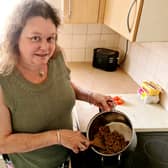 Alison Preest with food she has made for her YouTube channel ‘cooking on benefits’.  A savvy mum reveals the shopping and cooking hacks that enable her to cook meals for her family for as little - as 75p. 