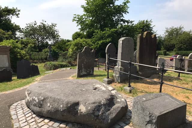 This granite slab marks the final resting place of Ireland's three patron saints (Photo: Amber Allott)