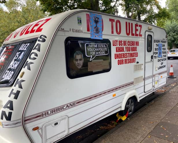 This caravan covered in ULEZ protest slogans was chained outside Sadiq Khan’s house in Tooting, London.