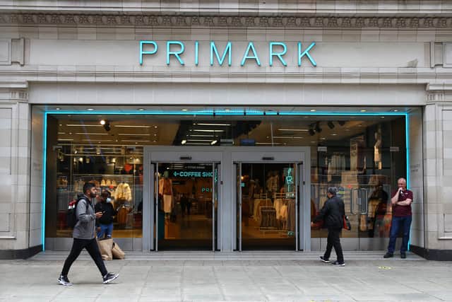 A pedestrian walks past a Primark store on Oxford Street, London.