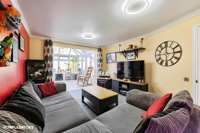 Two reception rooms give the house flexibility for relaxing, entertaining or creating a separate workspace, with a conservatory providing another living area