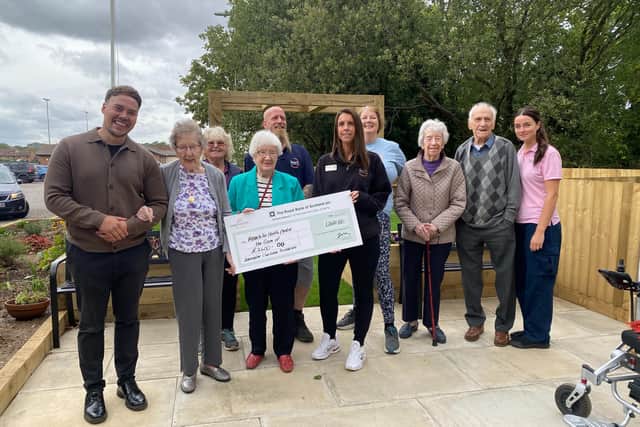 The Reach For Health Centre receive cheque
from Overslade House Care Home