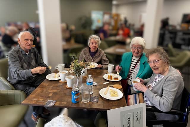 Overslade House residents enjoy refreshments at The Reach For Health Centre, Daventry