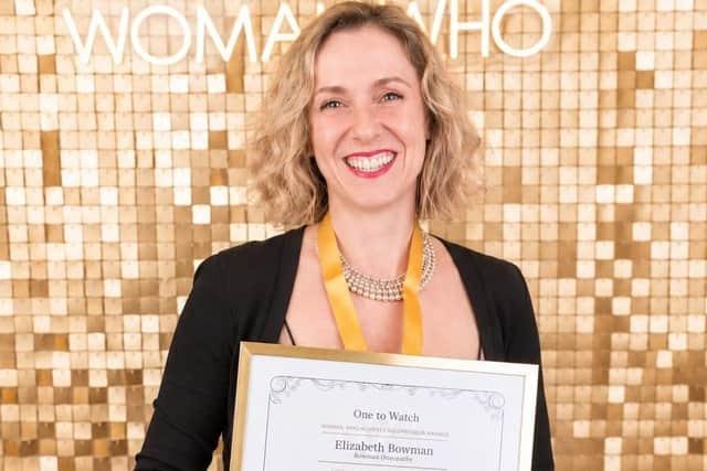 Elizabeth receiving her Solopreneur award