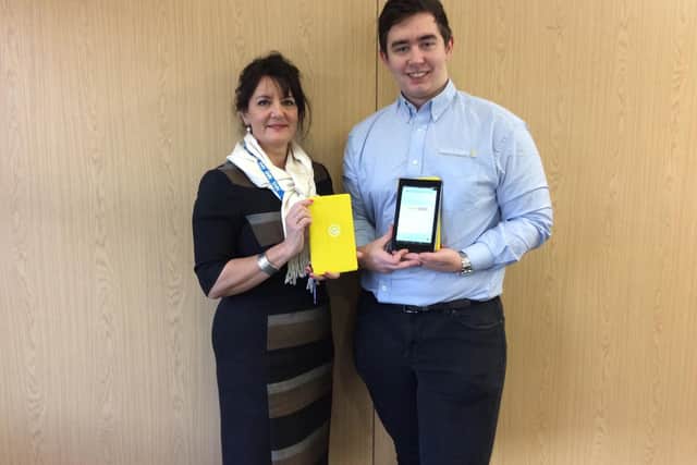 Northamptonshire Clinical Commissioning Group head of quality improvement Gabriella OKeefe and Sundown Solutions expert analyst Connor Johnston celebrate the award nomination for the yellow bracelet scheme