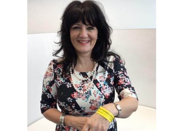 Northamptonshire Clinical Commissioning Group head of quality improvement Gabriella OKeefe wearing one of the yellow bracelets