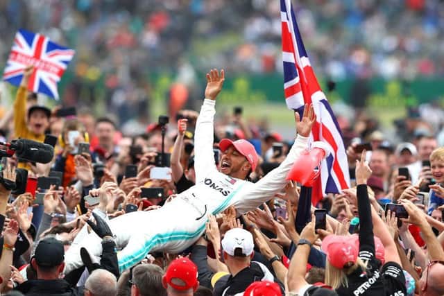 This was the scene after Hamilton's Silverstone victory in 2019  but no fans will be at the track this year