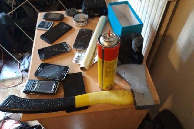 An chopper and several mobile phones were also unvcovered at an address in Wellingborough