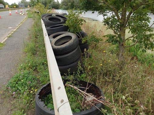 Highways England picked up more than 70 tyres dumped along the A45 near Northampton. Photo: Highways England