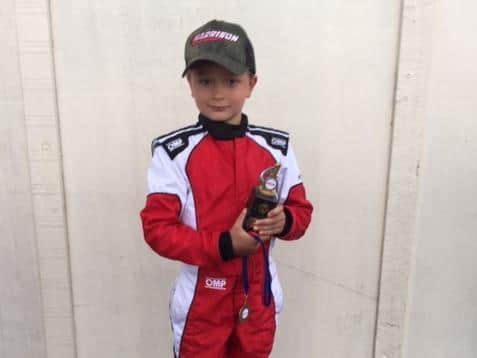 The seven-year-old won his first ever competitive race.