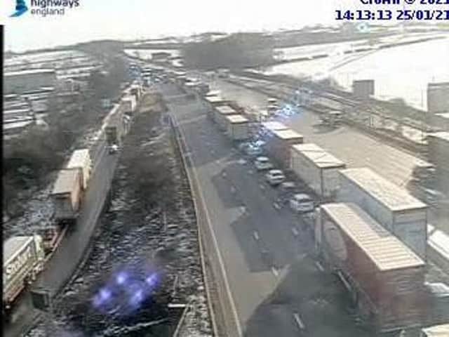 Highways England cameras showed queues building following the lunchtime smash on the M1