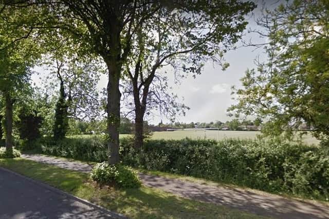 A woman was threatened by two men wearing balaclavas in Helicopter Park, Daventry.