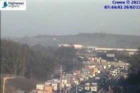 Highways England jam cams show traffic tailing back on the M1 near Northampton