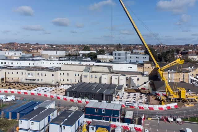 A giant crane lifted in the first buildings which will eventually form part of the main entrance at NGH