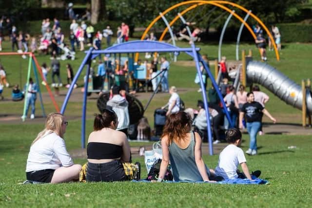 Crowds flocked to Northampton's Abington Park as temperatures soared on Tuesday. Photo: Kirsty Edmonds