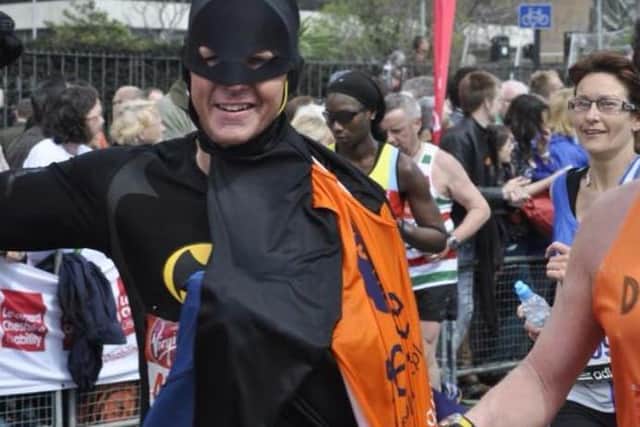 Running for charity, Glenique as Batman.