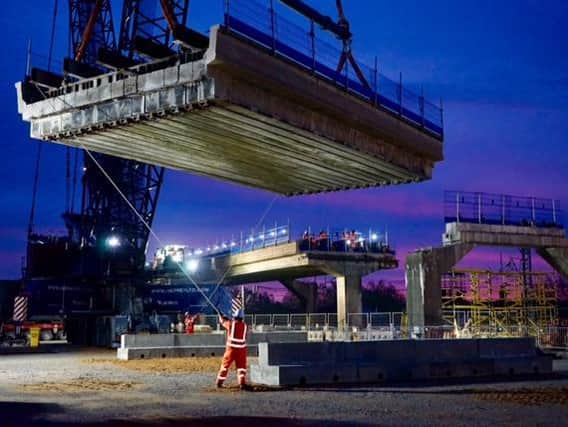 Massive cranes lift out sections of the Bletchley Flyover. Photo Network Rail