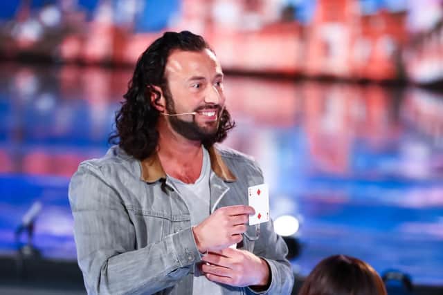 Sean Heydon shows the card Simon Cowell thought of after completing his trick on Britain's Got Talent: Unseen. Photo: Thames Media/ITV Copyright: other