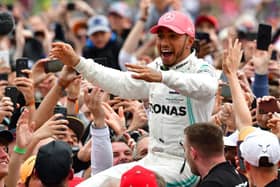 Lewis Hamilton celebrates victory at Silverstone in 2019 but the world champ will be racing with no fans this year. Photo: Getty Images
