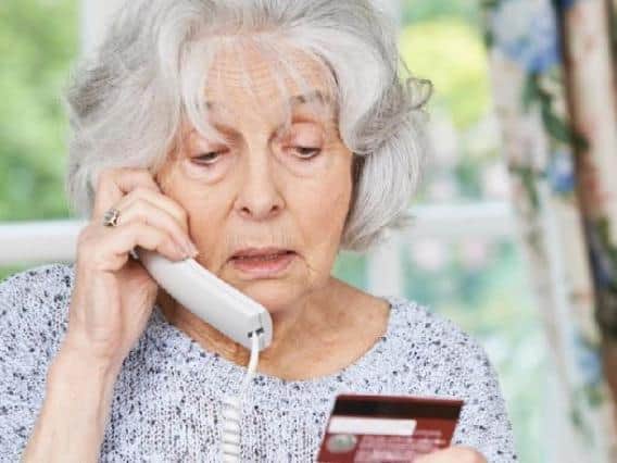 Cold-callers scammed thousands from a woman in her 90s in Northamptonshire