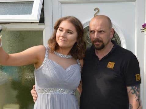 Jordan pictured with her dad at home ahead of his stint in hospital with the virus.