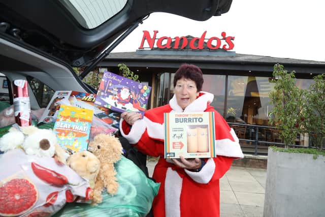Jeanette Walsh - Mother Christmas - with the toys that will go to children in need across the county