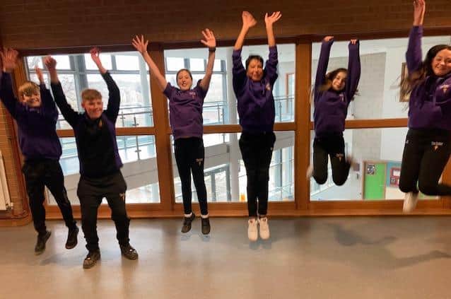 Students celebrate Ofsted success.