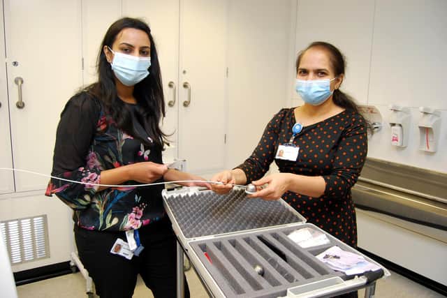 Lead radiotherapist Bansi Mulji-Shah and clinical oncologist Dr Deepali Vaidya with some of the new equipment used to deliver the treatment.