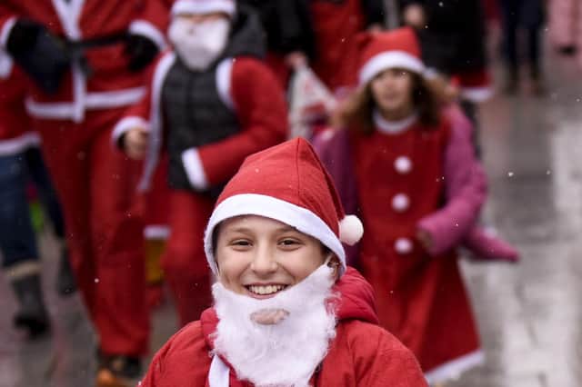 Seeing red for Santa run.
Picture: Getty Images.