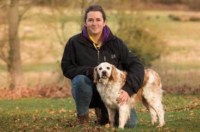 Laura with one of her dogs. Picture: Annie Bee Portrait.