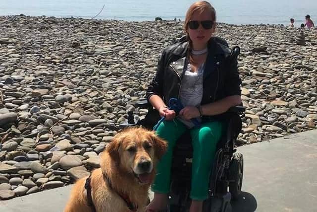 Holly with her dog Dexter.