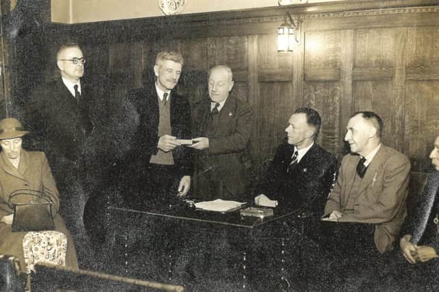 John (fourth from right) with town councillors.