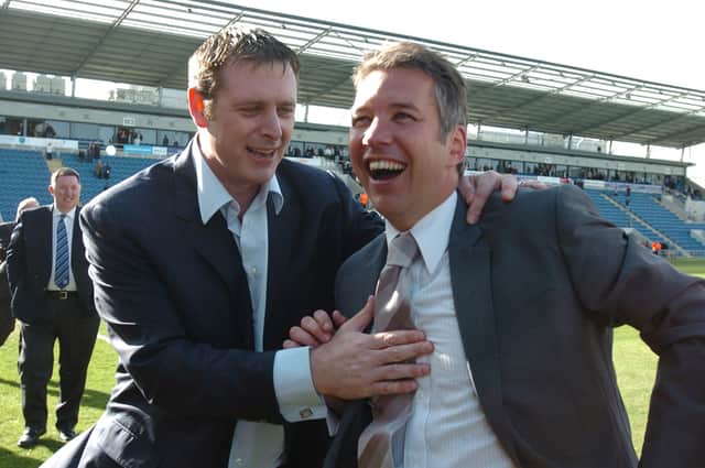 Posh chairman Darragh MacAnthony (left) and Darren Ferguson after winning promotion to the Championship at Colchester in April, 2009.