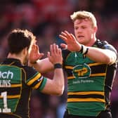 Tom Collins and David Ribbans celebrated a stunning Saints try, but it wasn't enough to earn the win at Kingsholm on Saturday