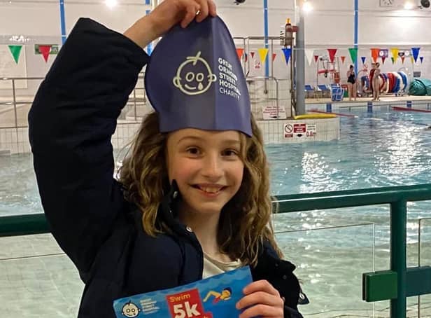 Grace is swimming to raise money for hospital.