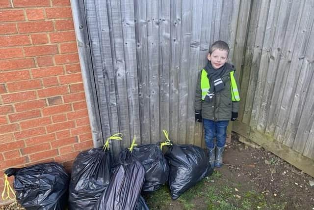 Joseph Dooley with his first litter picking haul.