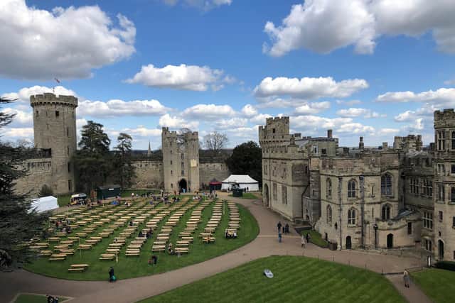 Tables and chairs provide a huge picnic area on the castles lawn. Image: JPI Media.