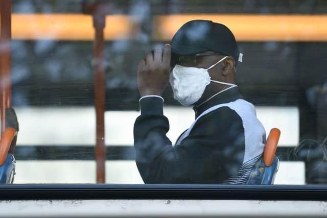 Face coverings have been mandatory in shops and on public transport since last year with £200 fines for those who flout the rules.