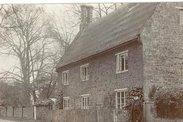 Watford, Church Street in 1910: Mr Newton, Lord Henley's Estate Carpenter stood outside of his house.