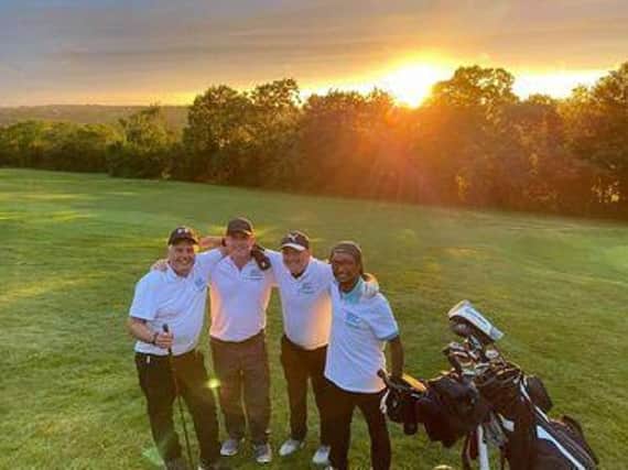 Mark Craig, Tom Gibbs, Kevin Everett  and Spencer Mabanga on the golf course.