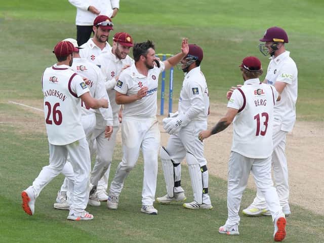 Simon Kerrigan is the centre of attention after grabbing the wicket of former England man Gary Ballance