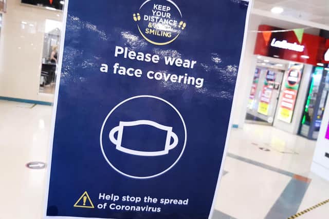 Rules requiring people to wear face coverings and stay two metres apart were dropped on Monday