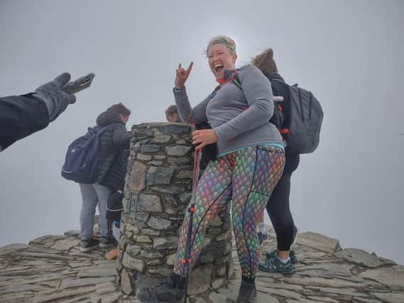 "I did it!" Emily Wright at the top of Snowdon.