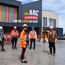 Councillor Lizzy Bowen (front) and Councillor Jake Roberts (far right) with staff from West Northants Council and Willmott Dixon at the cinema development.