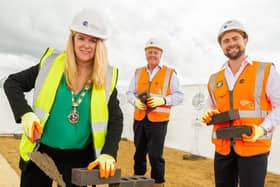 Andy McDermott, Orbit Homes regional managing director, was joined by mayor Karen Tweedale to lay the foundation stone at the first shared ownership unit at Micklewell Park in Daventry