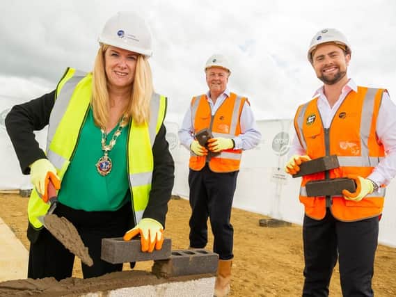 Andy McDermott, Orbit Homes regional managing director, was joined by mayor Karen Tweedale to lay the foundation stone at the first shared ownership unit at Micklewell Park in Daventry