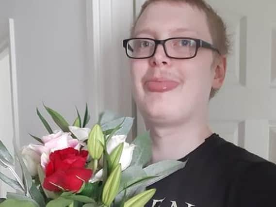Ashley pulls a cheeky face for Sian, who filled their home with flowers now he's allowed them.