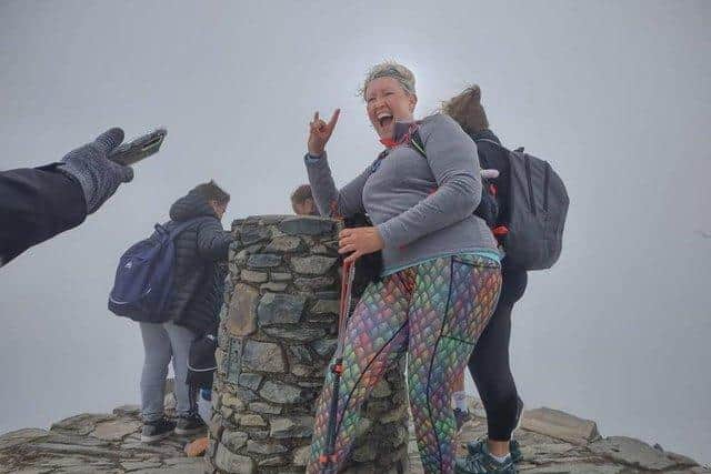 "I did it!" Emily at the top of Snowdon.