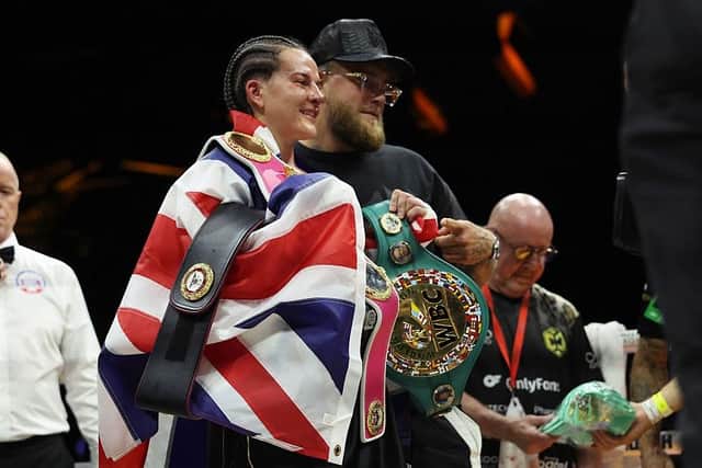 Chantelle Cameron poses for a picture with promoter Jake Paul after her victory over Mikaela Mayer