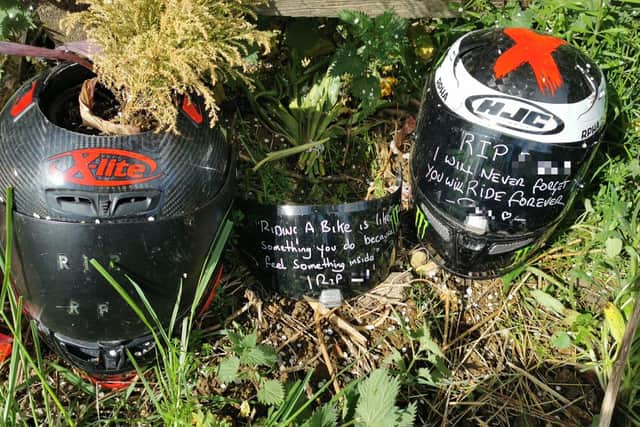 Tributes left by the A5 after a bike rider died in a collision near Weedon in March — one of 12 victims of fatal crashes in the county so far in 2022